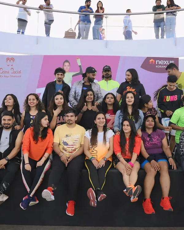 A group photo with fellow instructors and participants at a 'Zumba for a Cause' event. I am proud to use dance to support fundraising for underprivileged children and give back to the community.