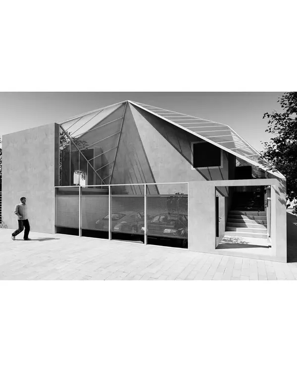 A render of the "House with Three Gables," an unbuilt project from 2017. The design features a distinctive triple-gabled roof and a sunken court, creating a unique spatial arrangement on a suburban plot.