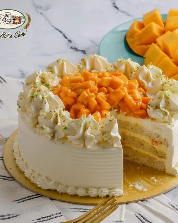 Our Fresh Mango Cake is loaded with juicy, ripe mango chunks and layered with light cream. It's a seasonal best-seller that truly captures the taste of summer.