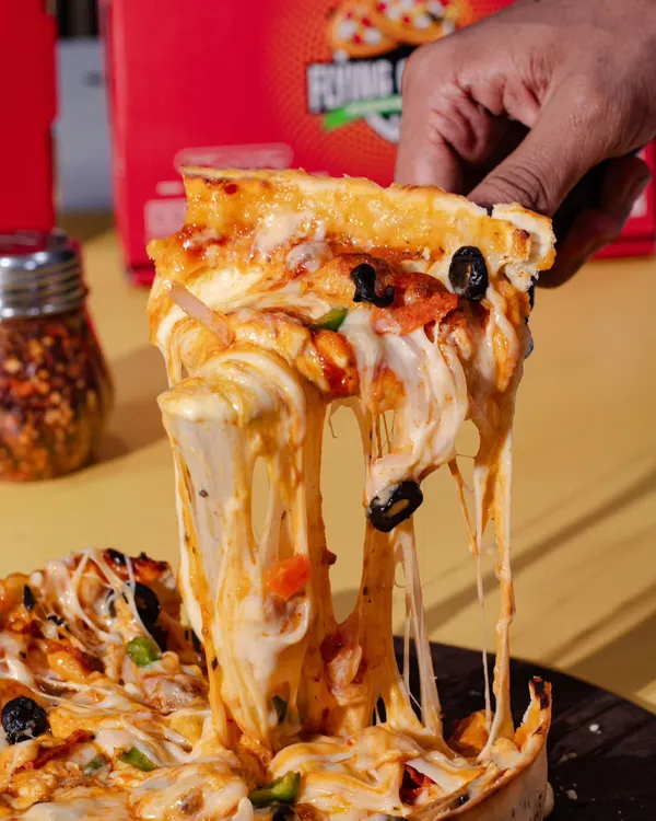 We know how to get that perfect cheese pull. This shot for Flying Crust pizza makes you feel the gooey, cheesy goodness, making it a perfect hero shot for any pizza brand.
