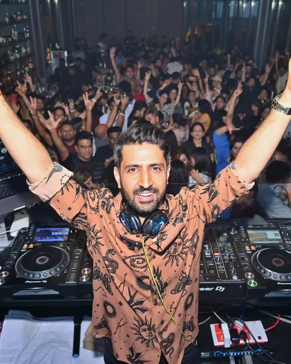Arms wide open, embracing the incredible energy from a packed house at Babylon, Hyderabad. Club gigs like this are special because the connection with the audience is so immediate and powerful.