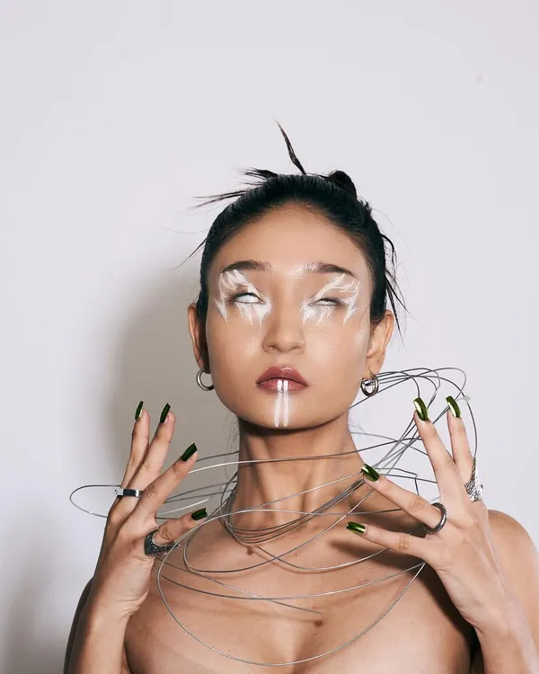 This is an example of my experimental work, using graphic shapes and unconventional techniques to create a striking, futuristic look. This style is perfect for high-fashion editorials or projects that need a bold, artistic statement.