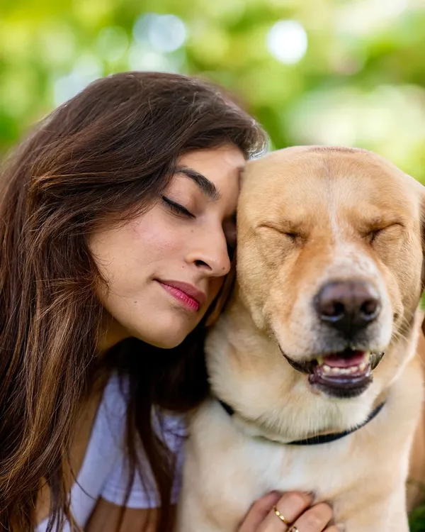 Some called it fate, some called it destiny. All I know is that it was meant to be. This photo captures the deep, peaceful connection between a woman and her dog, Prancer. It's a moment of pure love and gratitude.