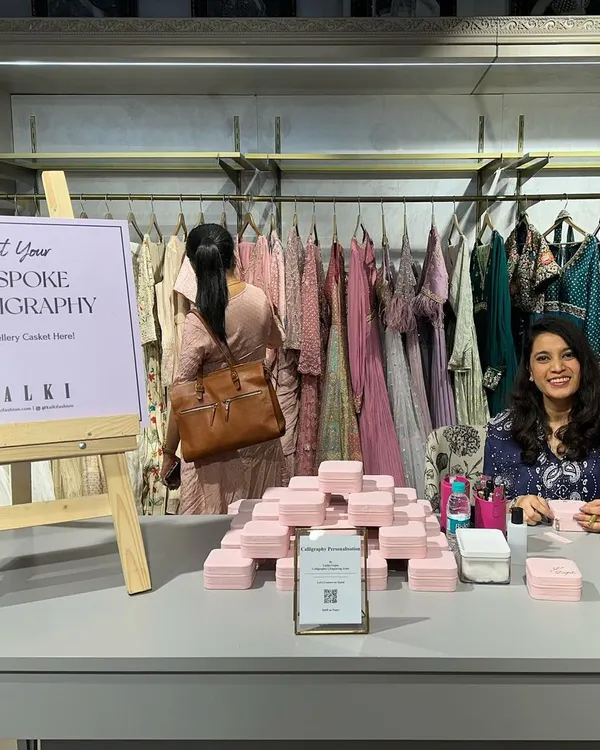 Here I am at my bespoke calligraphy station for the Kalki Fashion store launch in Bangalore. I love creating these interactive experiences where guests can get jewelry caskets and other items personalized live.