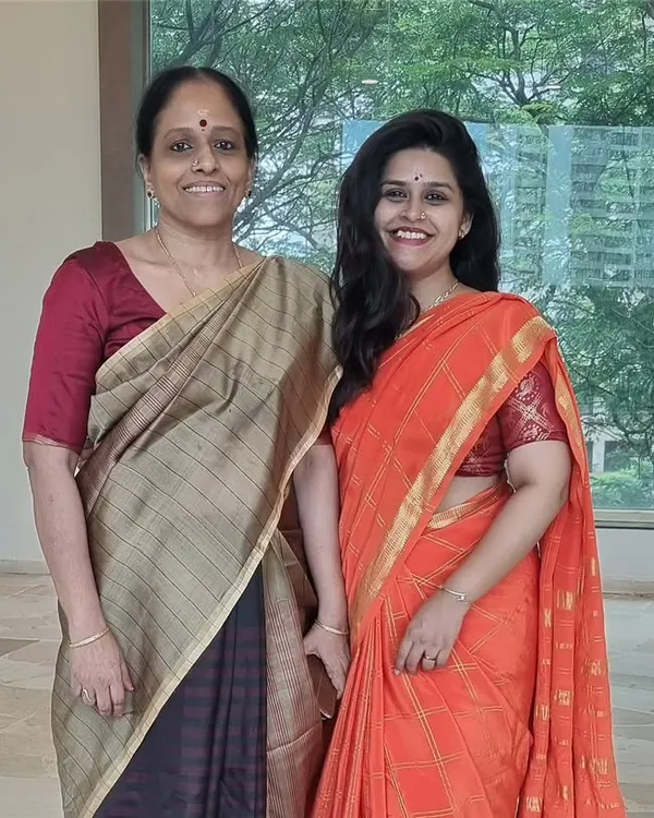With my Guru, Smt. Revathi Srinivasraghavan. The knowledge and values she has imparted to me are the foundation of my own teaching. This relationship is at the heart of the Guru-Shishya tradition I follow in my classes.