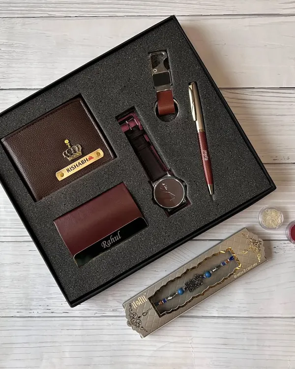 A classic and sophisticated gift set for men. This hamper includes a personalized wallet, watch, pen, cardholder, and keychain, all neatly arranged in a premium gift box.