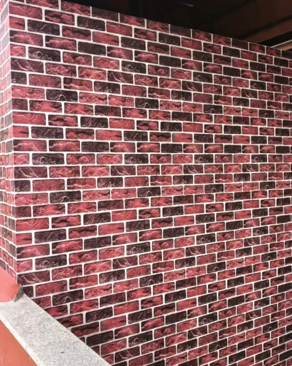 A realistic red brick wallpaper that gives an authentic, industrial look to this exterior-facing wall. My installation ensures the brick pattern aligns perfectly.