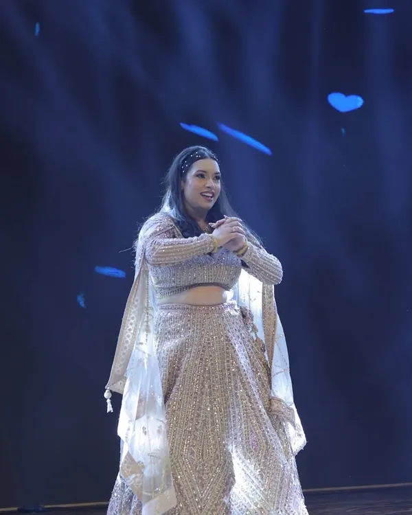 A bride enjoying her solo performance. My goal is to make every bride feel confident and radiant during her moment in the spotlight.