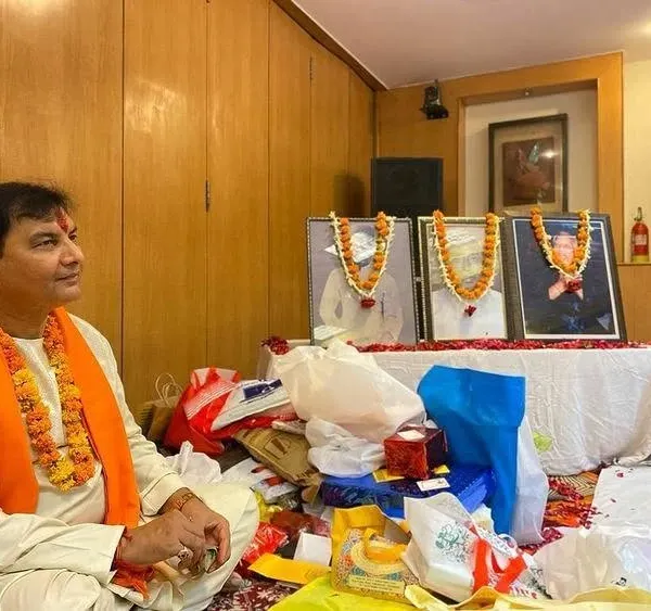 A personal moment from our Guru Purnima ceremony in 2022. I am sitting before the portraits of my revered gurus, offering my respects. This day is a beautiful reminder of the knowledge and blessings they have bestowed upon me.