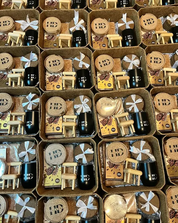 A large order of sustainable gift sets prepared for HD, featuring branded cork coasters and custom tumblers. This shows my capability to deliver unique, eco-friendly gifts in bulk.
