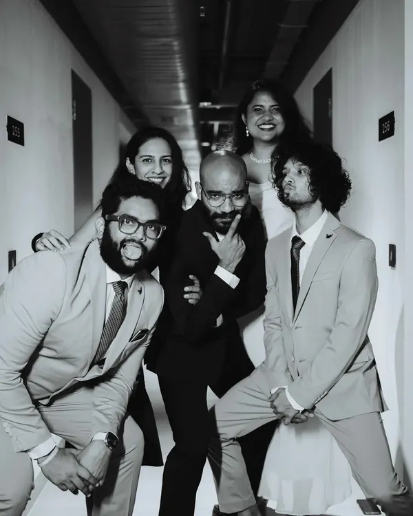 Unfiltered, unscripted, unforgettable. A fun, candid black and white photo of me and my photography team, the crew behind the lens.