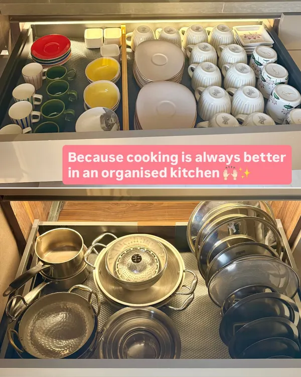 This is what we mean by creating a system. The top drawer holds everyday crockery, while the bottom is for steel pots and pans. Each item has a home, making cleanup and cooking a breeze.