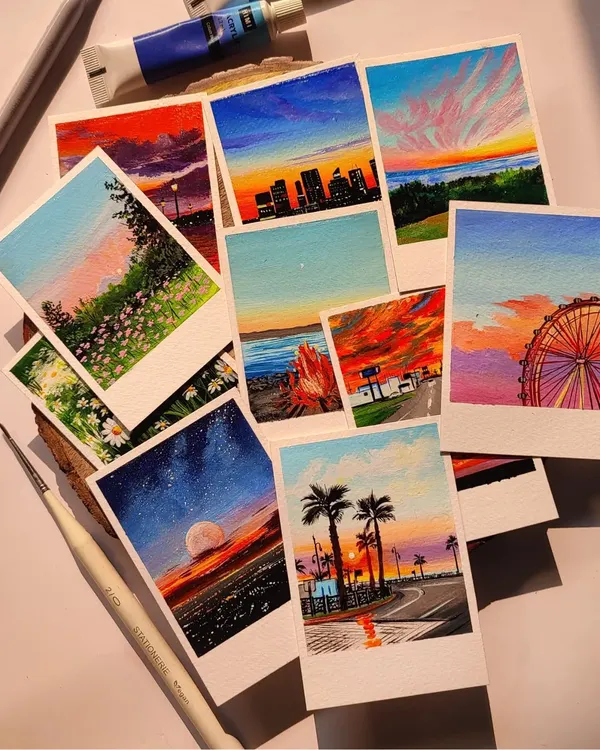 A collection of custom landscape and scenery polaroids I painted for a client. From cityscapes at dusk to dreamy beaches, each acrylic painting captures a different mood and memory.