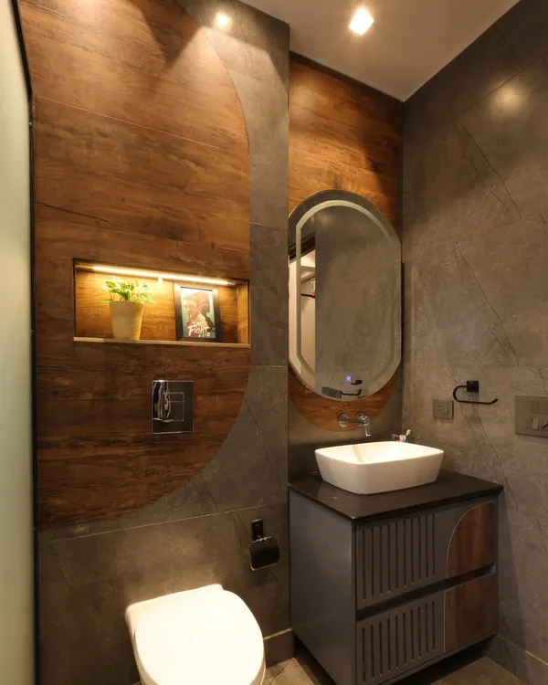 In this washroom from the Monochrome Oasis project, I used a combination of stone-look and wooden tiles in a semi-circle pattern to add warmth and visual interest.