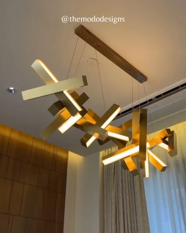 Design isn't just what you see at first glance. This sculptural, modern chandelier is a perfect example of how a light fixture can also be a piece of art, transforming the entire room.