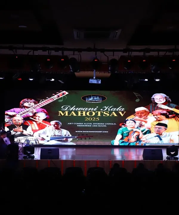 The stage is set for the Dhwani Kala Mahotsav 2025. This image captures the grand scale of our annual event, which celebrates all forms of art, including a dedicated exhibition for our drawing and painting students.