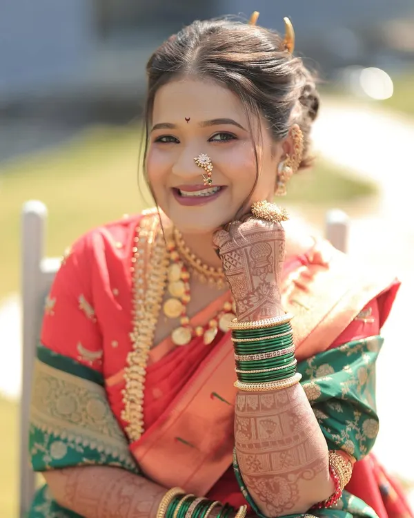 My favorite 'Navri' (bride) looking absolutely radiant. Her smile and her beautiful mehndi complete her traditional wedding look.