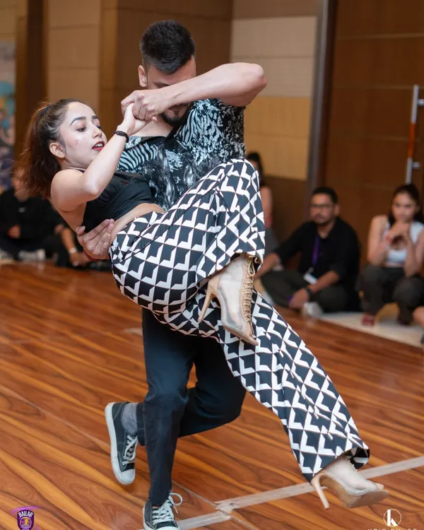 A powerful moment from Riya and Ravi's winning performance at the Olympiad of Kizomba qualifier. This dynamic lift showcases the strength, trust, and technique we instill in our competitive dancers.