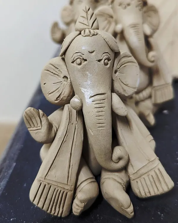 A charming Ganesha idol made by a participant in one of my workshops. I guide you through hand-building techniques to create your very own festive sculpture.