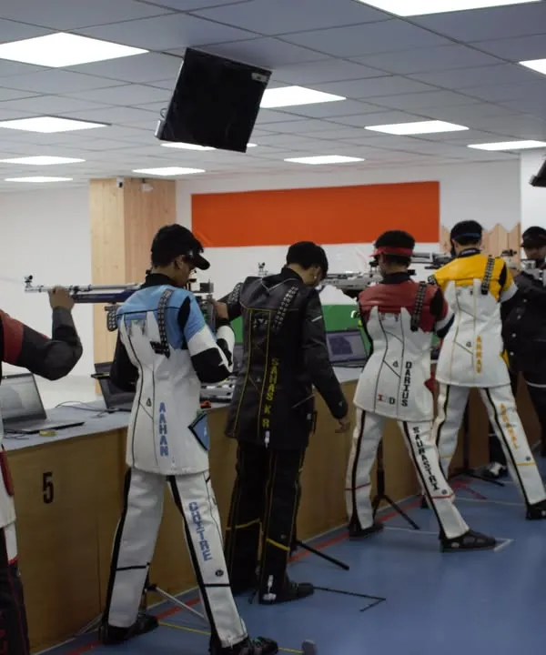 This is the moment of truth in a 10m Air Rifle final. We train our shooters to maintain complete focus and execute every shot with precision, even under the immense pressure of a competitive final.