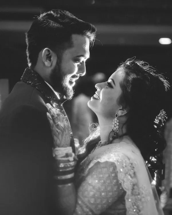 A classic black and white candid shot. The genuine smiles and eye contact between Ketki and Paras show the pure joy and love that I strive to capture in my photography.