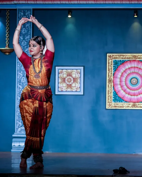A powerful stance from my performance at the Mumbai Natyanjali festival, an offering to Lord Nataraja, the cosmic dancer. The blue background and artwork created a beautiful setting for this devotional piece.