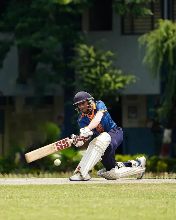 This is what it’s all about. A player in full flow, executing a powerful sweep shot during a high-stakes match on our Dehradun tour. We train for these moments, where technique and confidence come together.