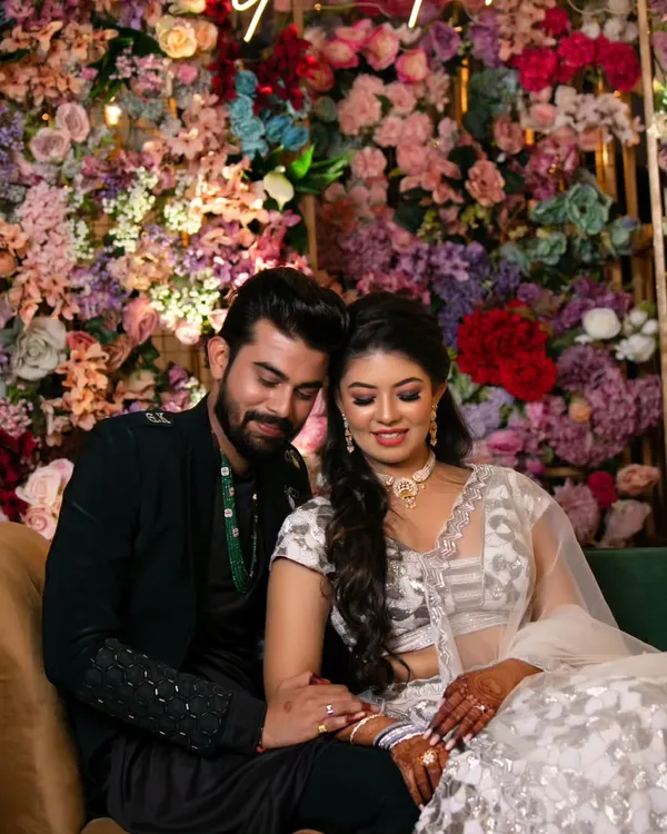 A quiet, loving moment between the happy couple. Prer's radiant makeup looks flawless and natural, capturing her 'lit-from-within' glow even in a soft, romantic setting.