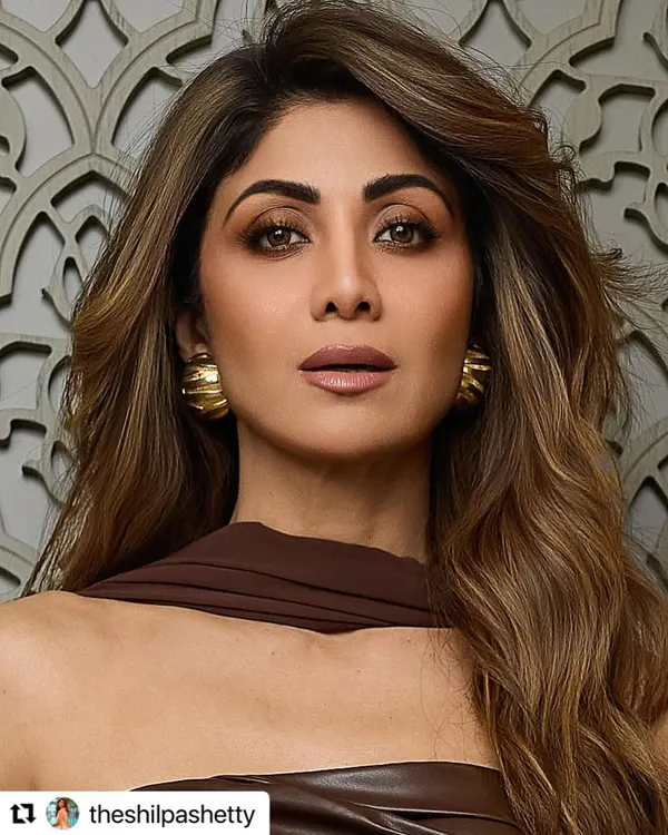 A close-up of the 'Hot Chocolate' color and style for Shilpa Shetty. The soft waves and warm tones complement her look perfectly.