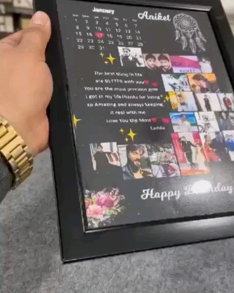 A close-up of the birthday collage frame, showing the high-quality UV printing and the layout that includes a calendar, photos, and a custom message.