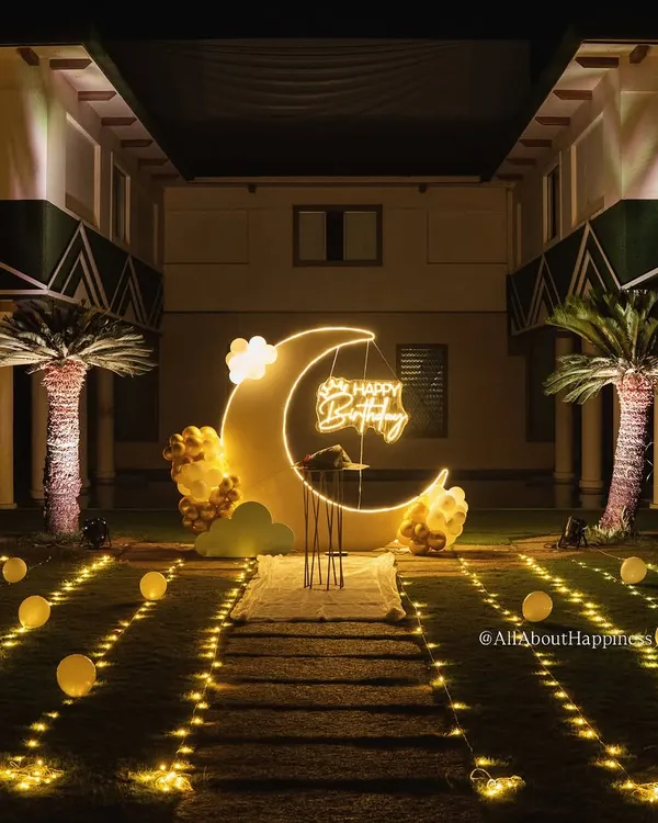 This is how we turn a simple lawn into a dreamy, moonlit celebration. We custom-built this large moon backdrop with integrated neon lighting to create a truly magical centerpiece for a special birthday.