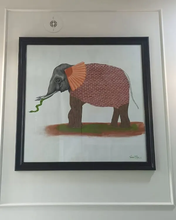 The 'Six Blind Men and an Elephant' painting, framed and displayed on a client's wall. It’s incredibly rewarding to see a conceptual piece that I created become a part of someone's home decor.