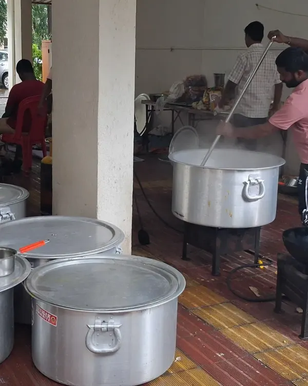 Behind the scenes of a bhandara for 1500 people. This shows the large-scale cooking in huge pots, which is necessary to feed such a large crowd.