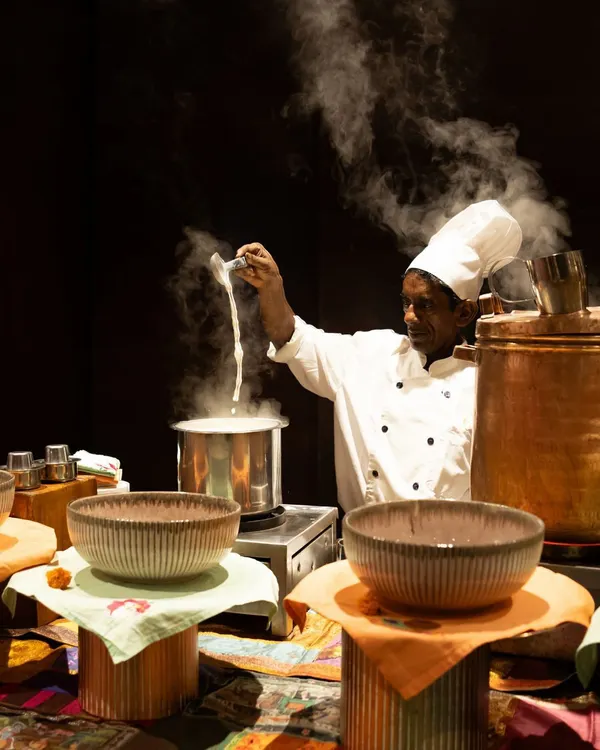 The dramatic pull of cheese from a freshly prepared dish at one of our live stations. This moment captures the heat, freshness, and culinary theatre that make our interactive counters a highlight of any event.