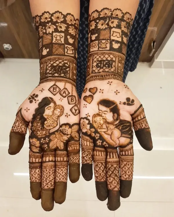 A complete baby shower story on hands, with portraits of the mother and father kissing the baby. The design includes 'aai-baba' in Marathi script and cute baby-themed blocks.