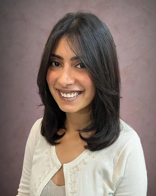 A long bob with curtain bangs for Aishwarya.