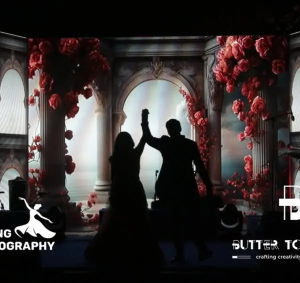 I'm currently obsessed with this visual! The silhouette of the couple against this grand, floral, palatial backdrop is just breathtaking. This is the kind of magic we create with our visual artists.