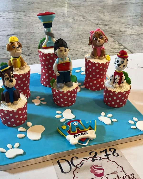 This full set of Paw Patrol cupcakes was our entry for a decorated cupcake competition. We handcrafted Ryder, Chase, Rubble, Skye, and Marshall, along with the Paw Patrol tower and logo, all from edible fondant.