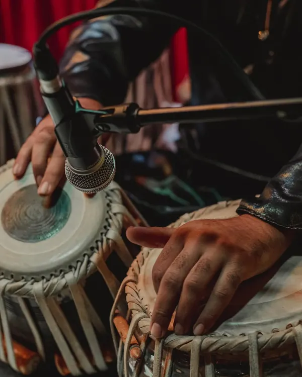 A close look at my hands on the tabla. For me, every touch and every beat is a form of expression. This is the heart of my craft, where years of practice and dedication come together to create rhythm.
