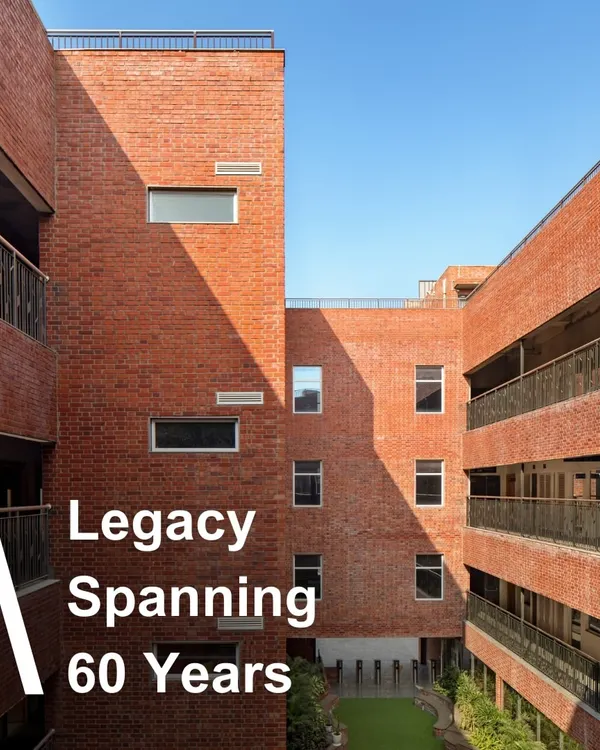 For 60 years, we have created architecture that responds to the needs of today while anticipating the challenges of tomorrow. This image of the HRM Global School, with its enduring brick facade, represents our long-standing legacy in educational design.