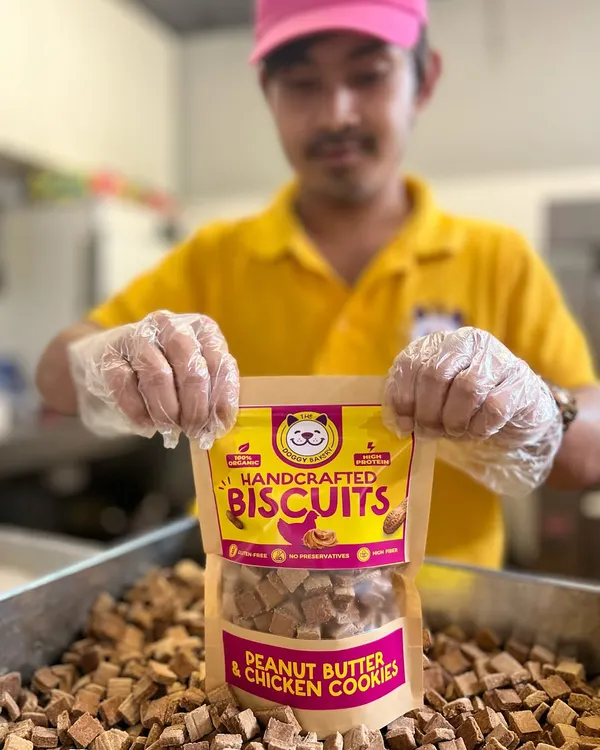 Here's a look at my Peanut Butter & Chicken Cookies, a unique combination of savory and nutty flavors that dogs love. Each biscuit is packed in a resealable pouch to maintain its crunch.