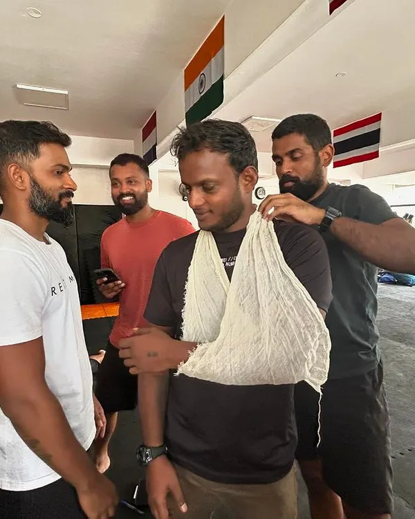 Learning how to properly apply a sling for an arm injury. Practical skills like this are crucial.