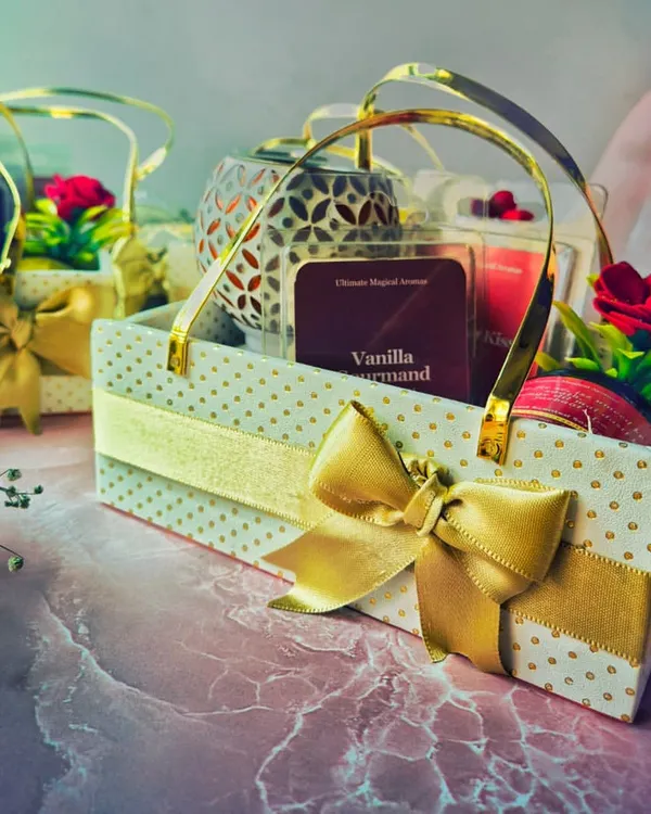 This beautiful custom gift basket is a perfect example of how I create memorable presents. It includes a wax warmer, wax melts, and a jar candle, all elegantly packaged with a personalized message for a client's dear friends.