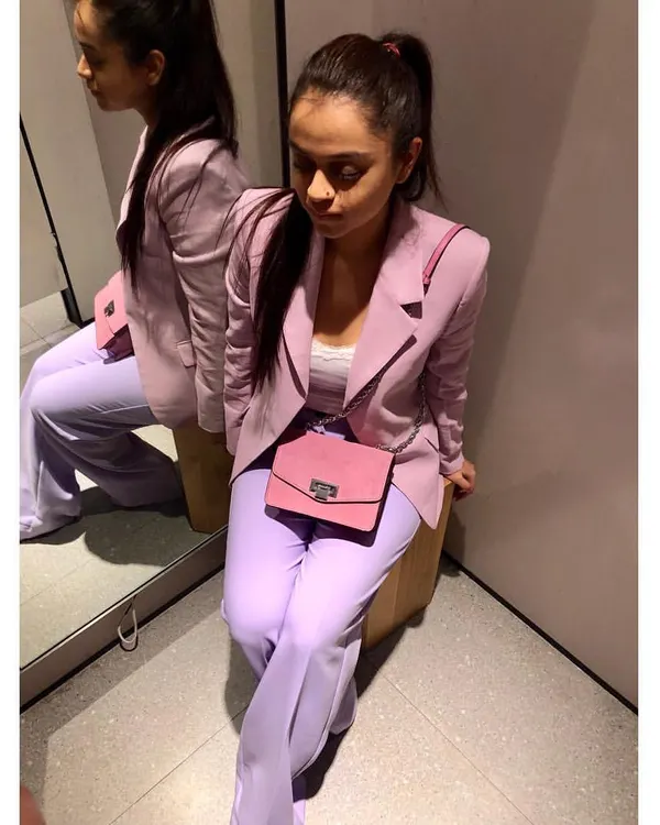A perfect example of taking corporate wear Up-A-Notch with a monochrome look. This ultra-violet suit plays with different tints and shades of the same color, creating a chic, powerful, and fashion-forward office ensemble.