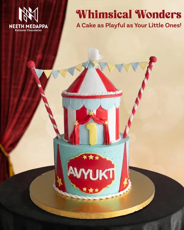 Step right up to a whimsical circus! This two-tiered cake, designed as a big top tent, is perfect for a playful and colorful first birthday celebration.