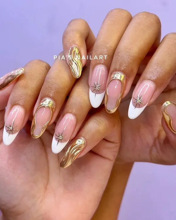 This is the kind of statement art I live for. A classic French manicure gets a modern, luxurious twist with sculpted 3D gold chrome detailing and starburst accents. This is how you make your nails the main event.