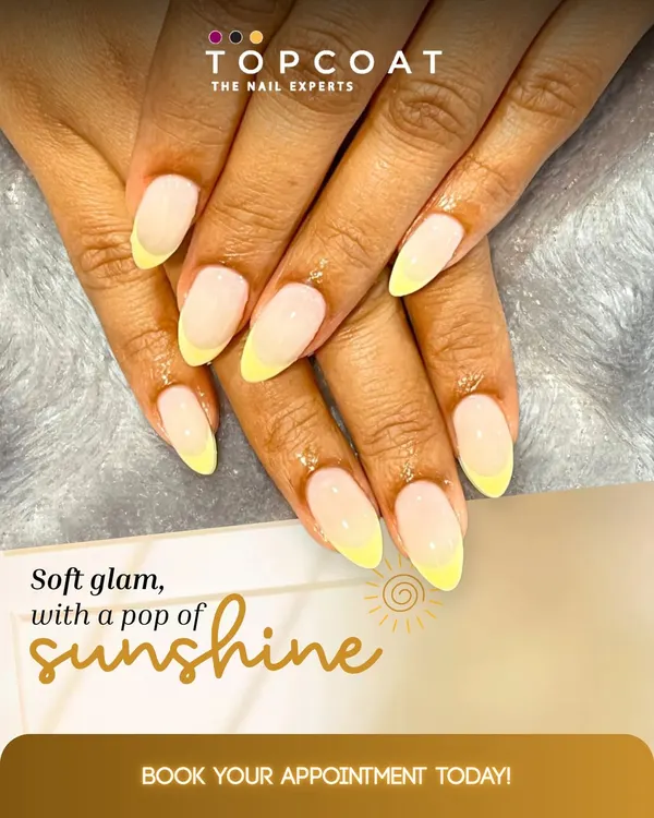 Soft glam with a pop of sunshine. This is a modern take on the French manicure, featuring a soft nude base and cheerful, pastel yellow tips for a fresh and subtle look.