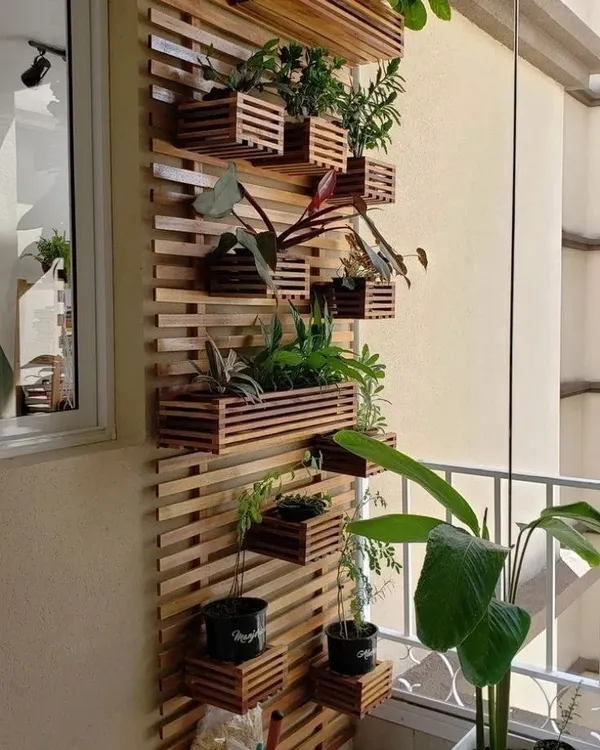 This custom-made, space-saving planter stand is crafted from solid pinewood. Its vertical design is perfect for balconies, allowing you to display a wide variety of plants without taking up valuable floor space.