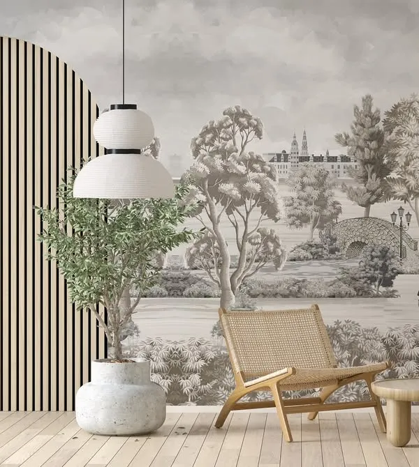 A classic Toile de Jouy mural from our Parisian Tales collection, depicting a scenic park view. This monochrome design, paired with modern furniture, creates a beautiful blend of classic and contemporary styles.