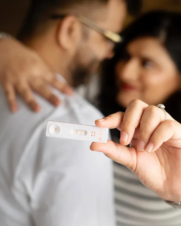 Two pink lines, and a lifetime of happiness ahead. This shot captures the very beginning of the journey, focusing on the positive pregnancy test that changed everything. It's a powerful and emotional memory to hold onto.
